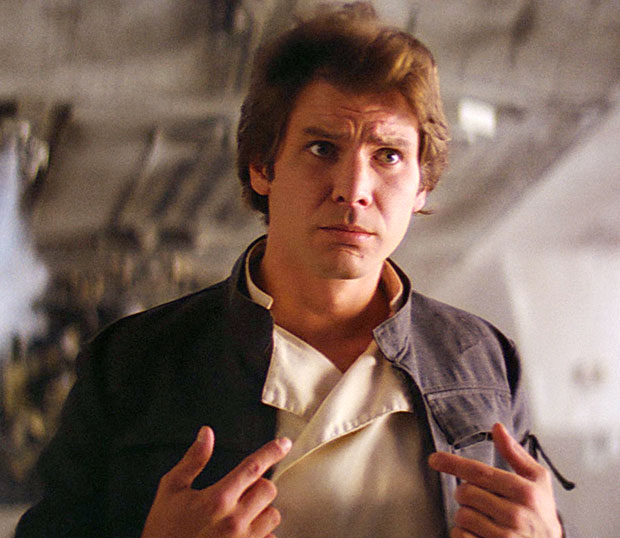 Harrison Ford as Han Solo pointing at himself